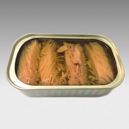 Tuna fillets in olive oil with basil